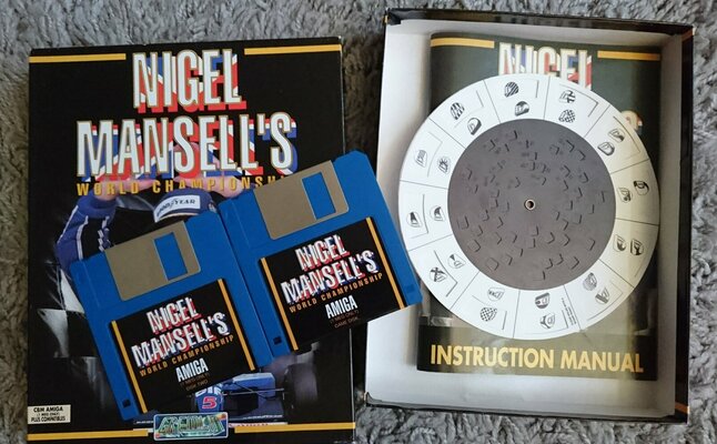 Nigel Mansells Disks & Manual.JPG