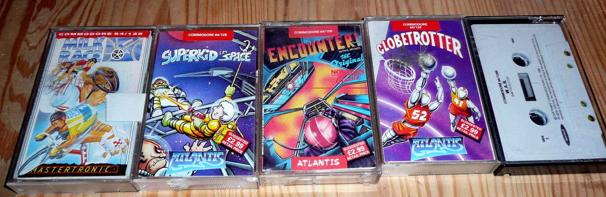 milk race - superkid in space - encounter - globetrotter - war - c64.jpg