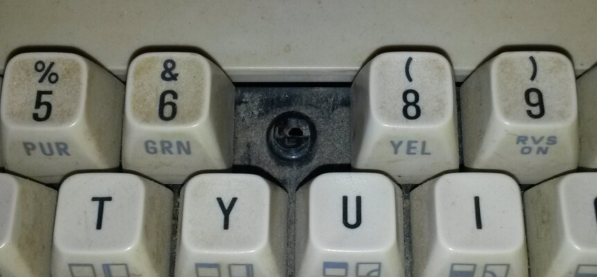 Closed - white C64c key: the "7" key (and spring and plunger) | AmiBay